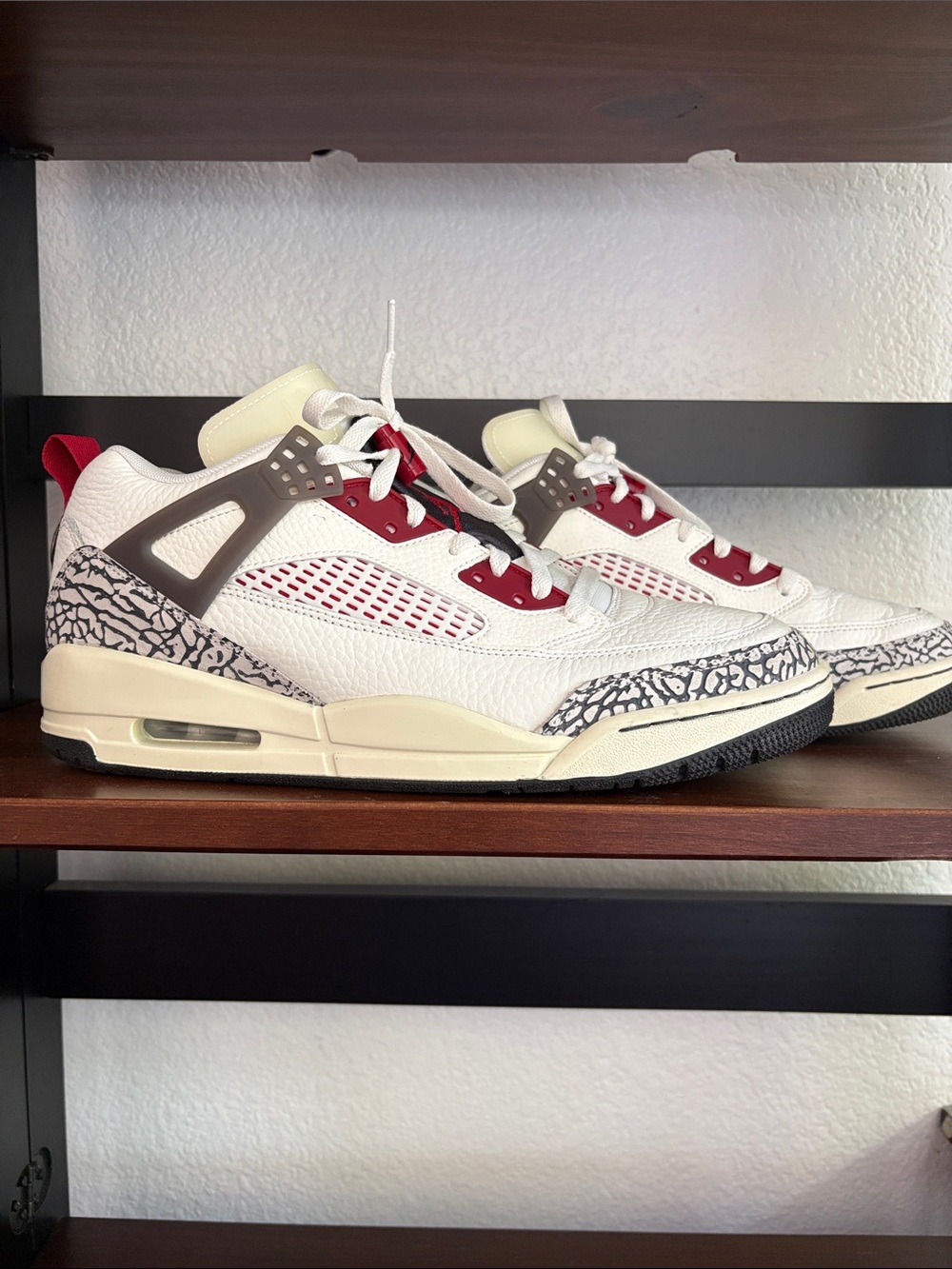 Jordan Spizike sneakers with cream and red coloring and elephant pattern